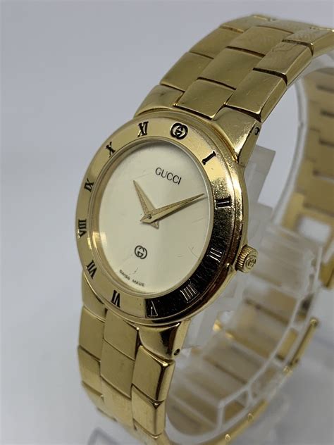 vintage gold gucci watch ladies